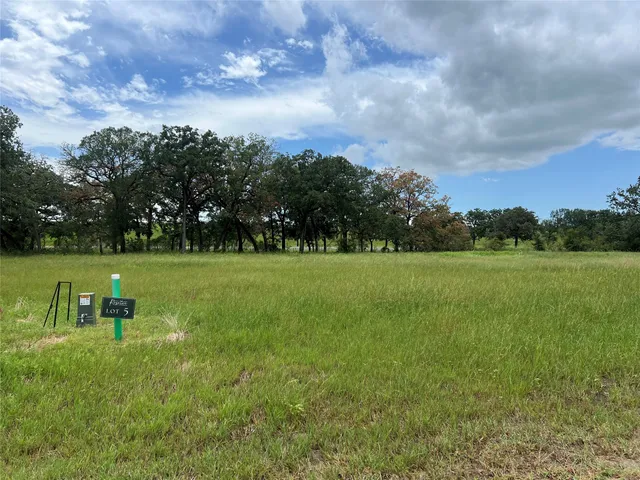a view of a golf course with a garden