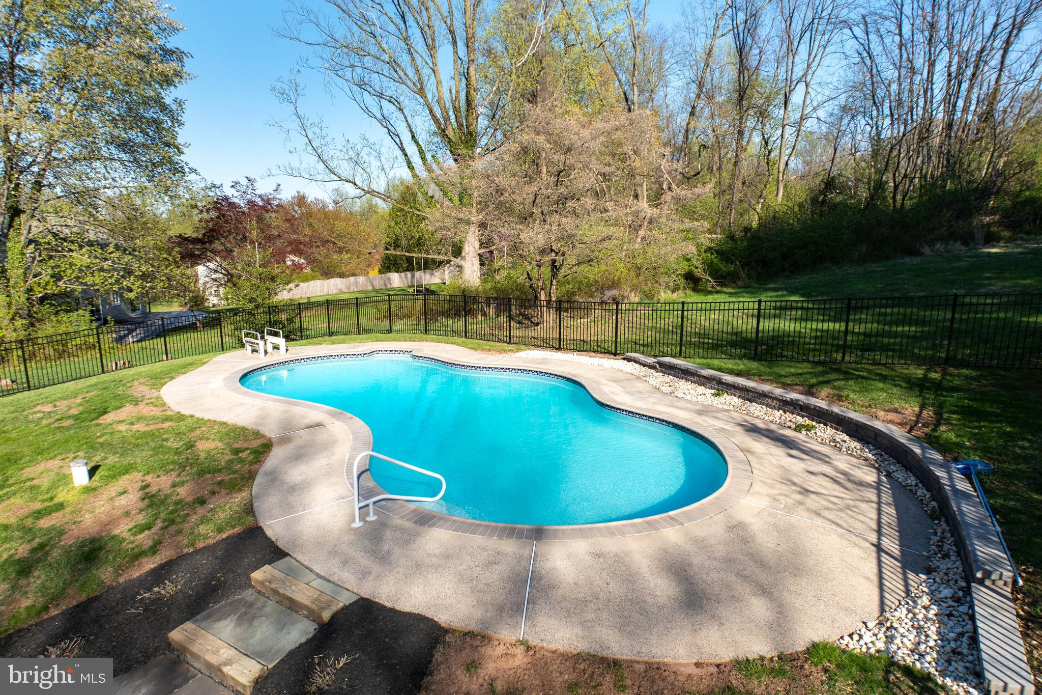 800 Scholl Road Pottstown, PA 19465 - Photo 11 of 49 a view of a swimming pool with a patio