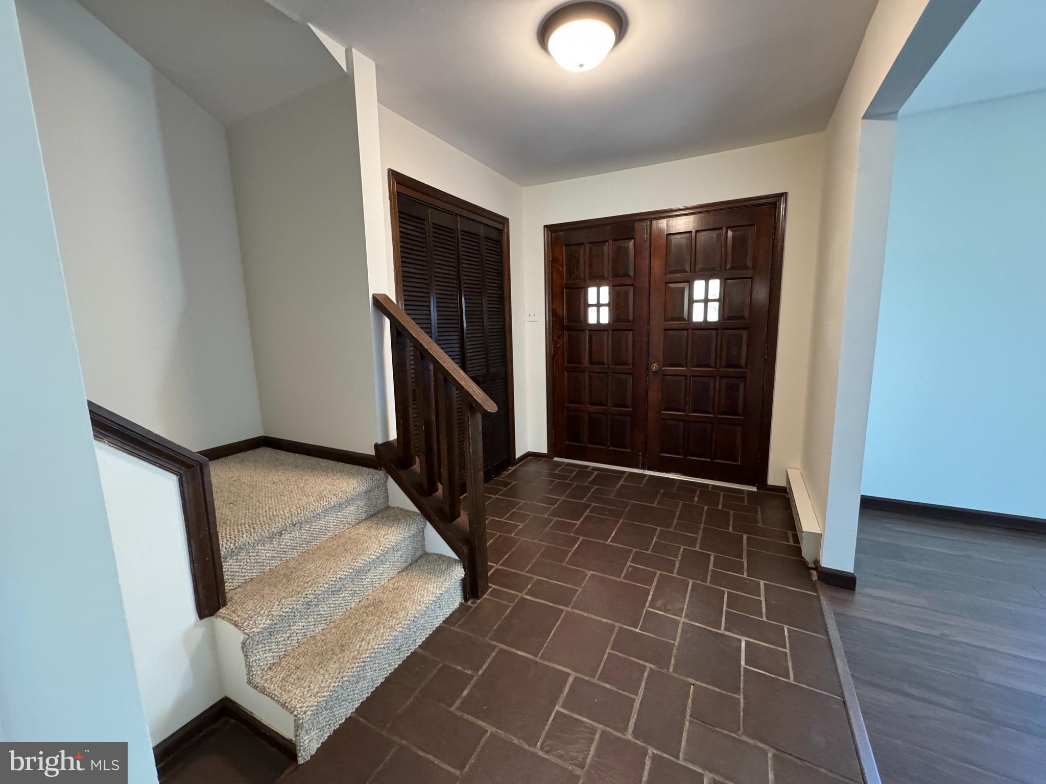 800 Scholl Road Pottstown, PA 19465 - Photo 21 of 49 a view of an empty room with wooden floor and a window