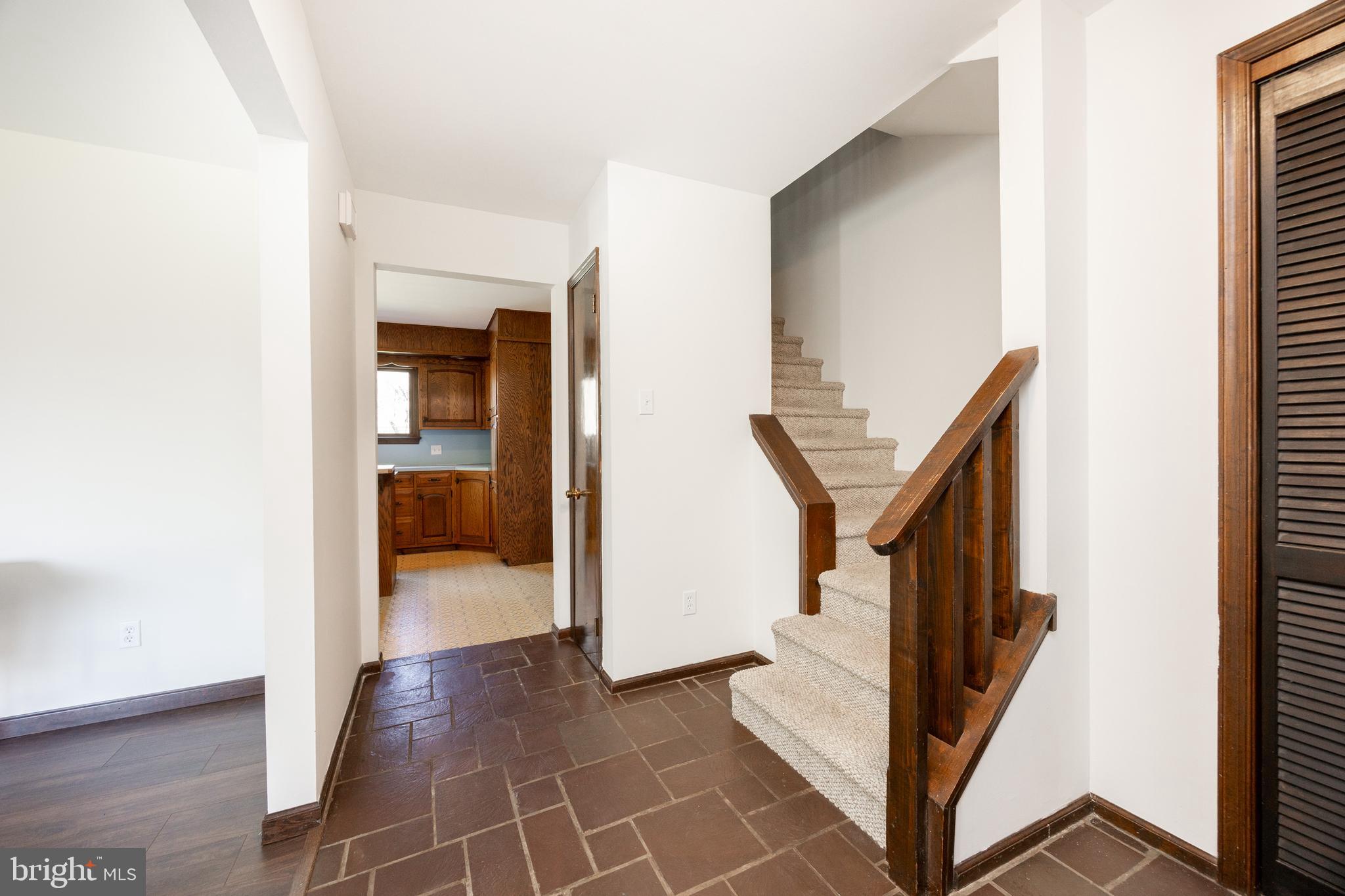 800 Scholl Road Pottstown, PA 19465 - Photo 22 of 49 a view of a hallway with wooden floor and staircase