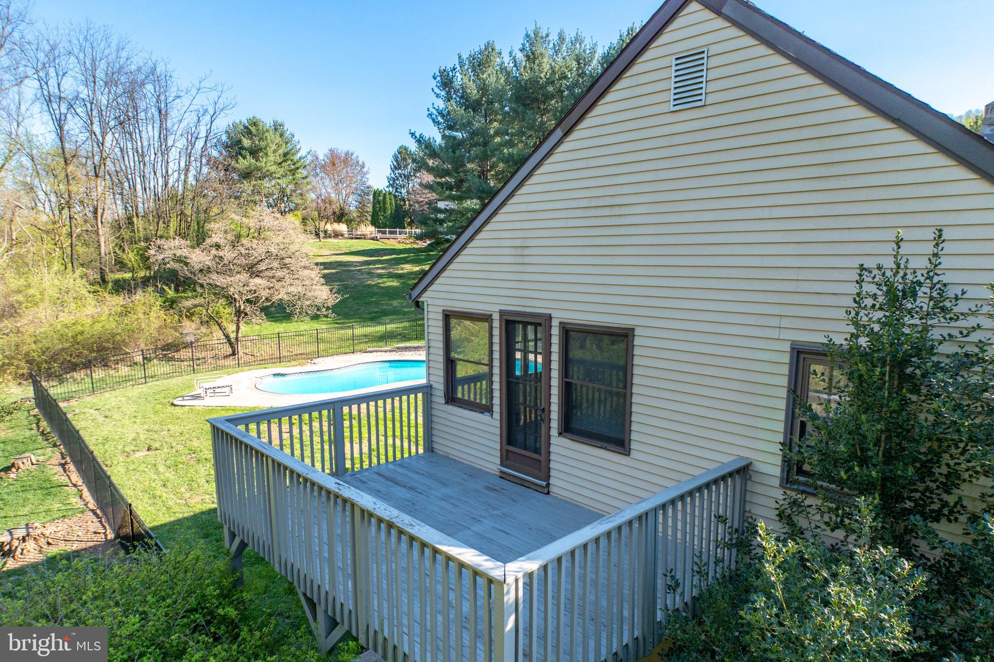 800 Scholl Road Pottstown, PA 19465 - Photo 29 of 49 a view of deck with large trees and wooden fence
