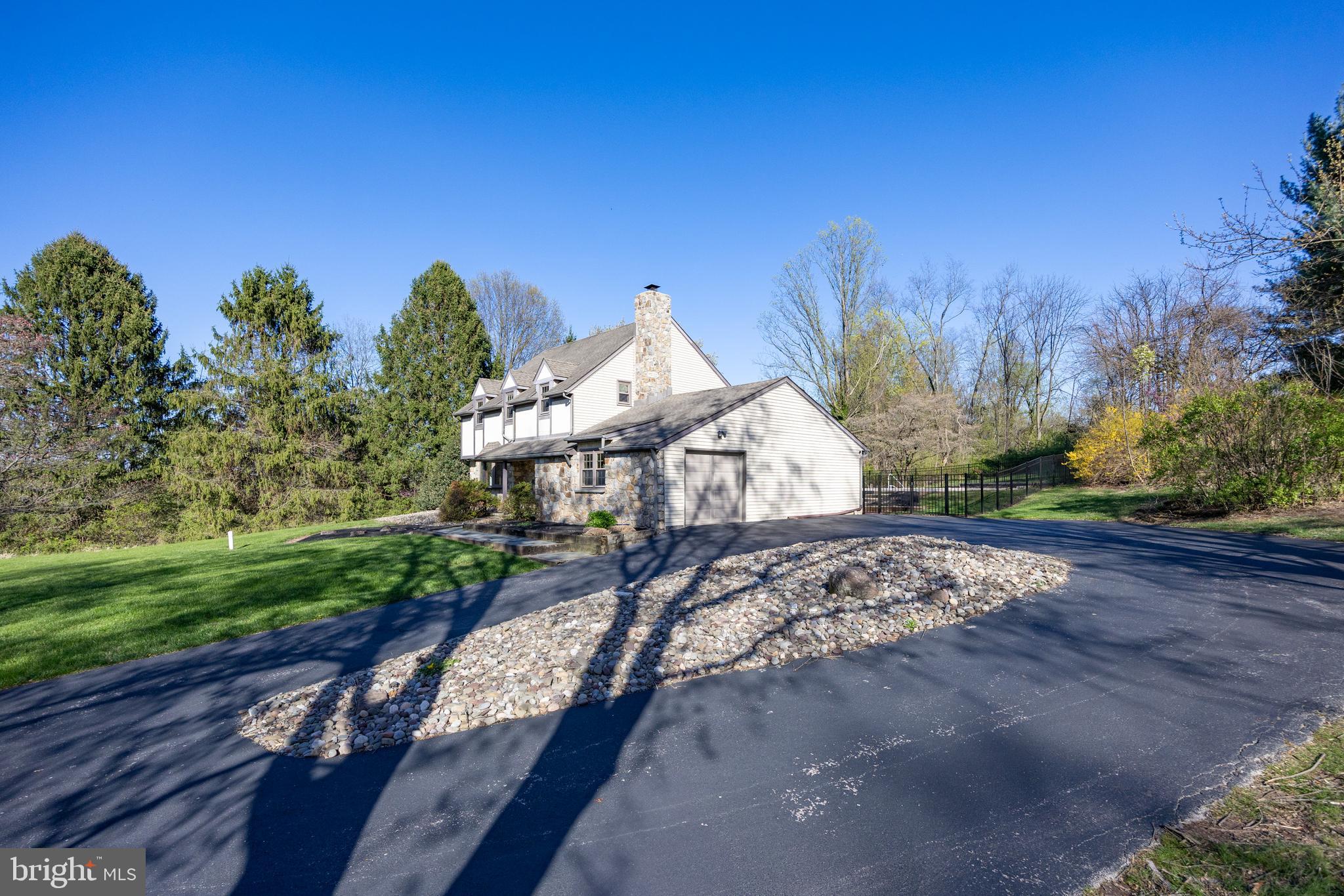 800 Scholl Road Pottstown, PA 19465 - Photo 40 of 49 a view of a house with a yard