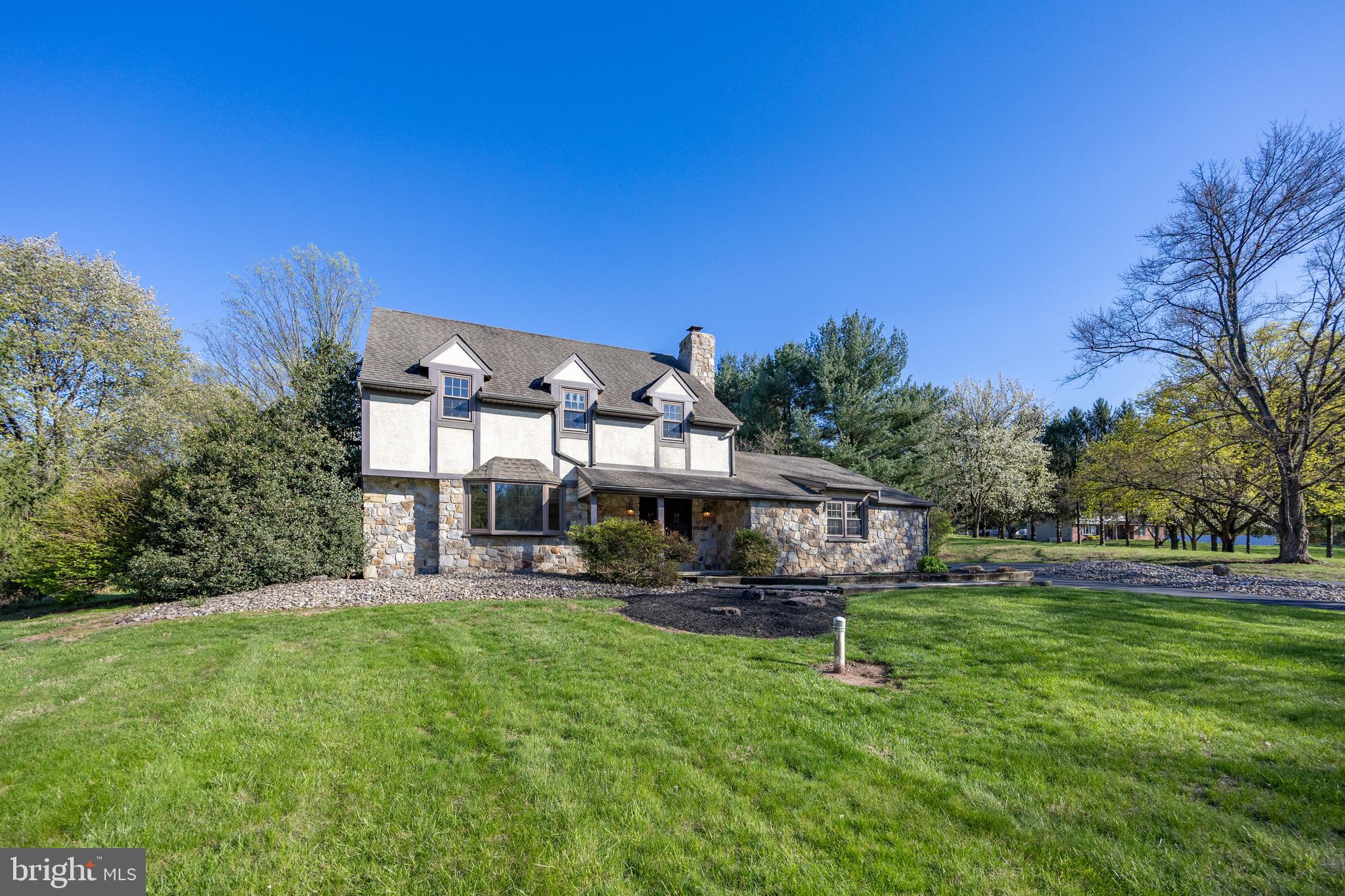 800 Scholl Road Pottstown, PA 19465 - Photo 42 of 49 a view of a big house with a big yard
