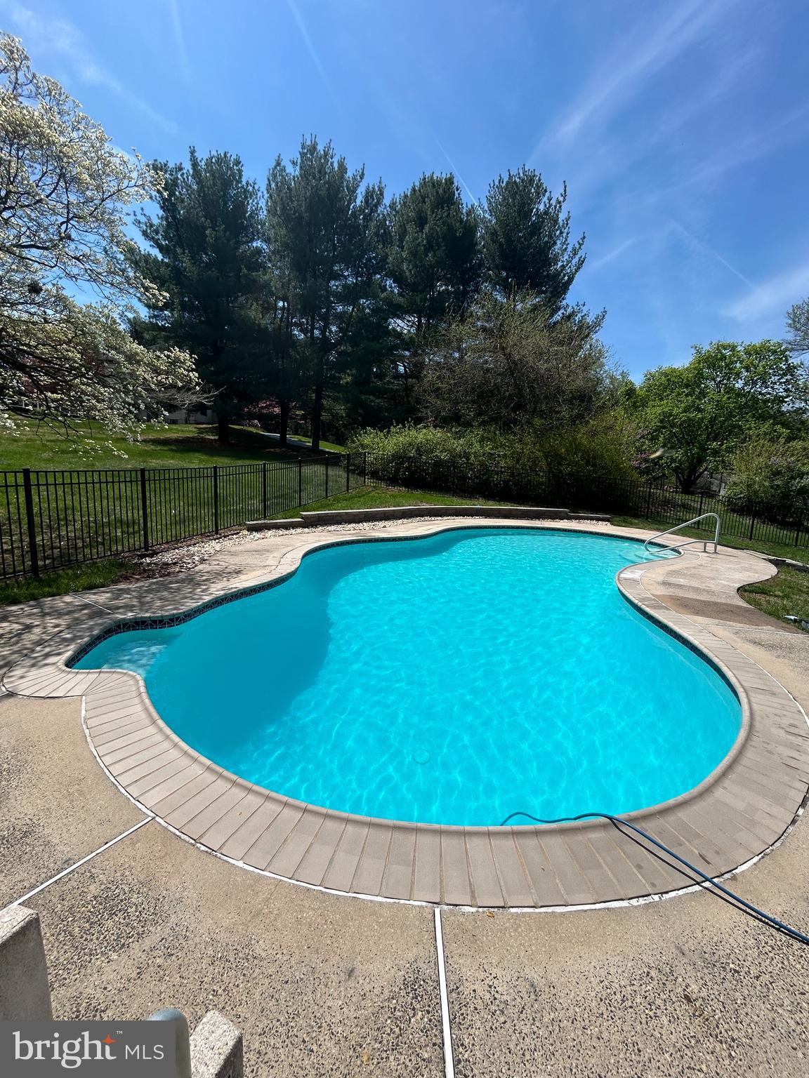 800 Scholl Road Pottstown, PA 19465 - Photo 45 of 49 a view of a swimming pool with an outdoor space and seating area