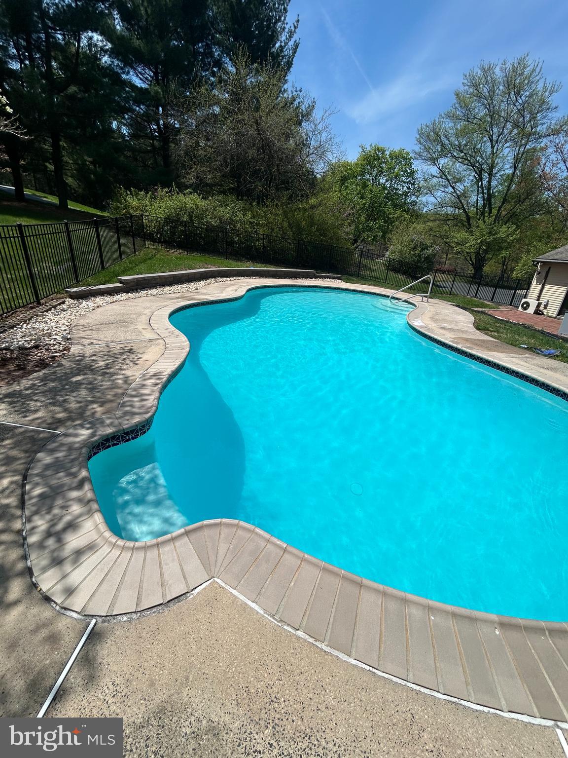 800 Scholl Road Pottstown, PA 19465 - Photo 46 of 49 a view of a swimming pool and a yard