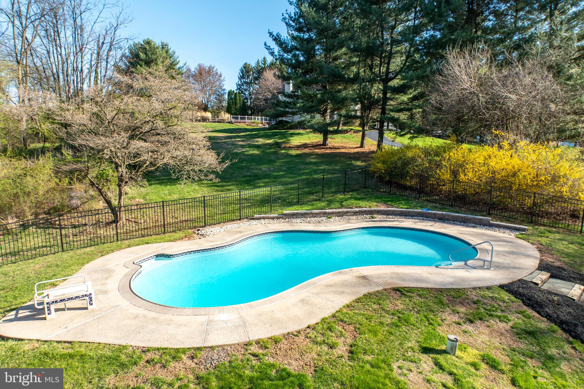 800 Scholl Road Pottstown, PA 19465 - Photo 48 of 49 a view of a swimming pool with a yard