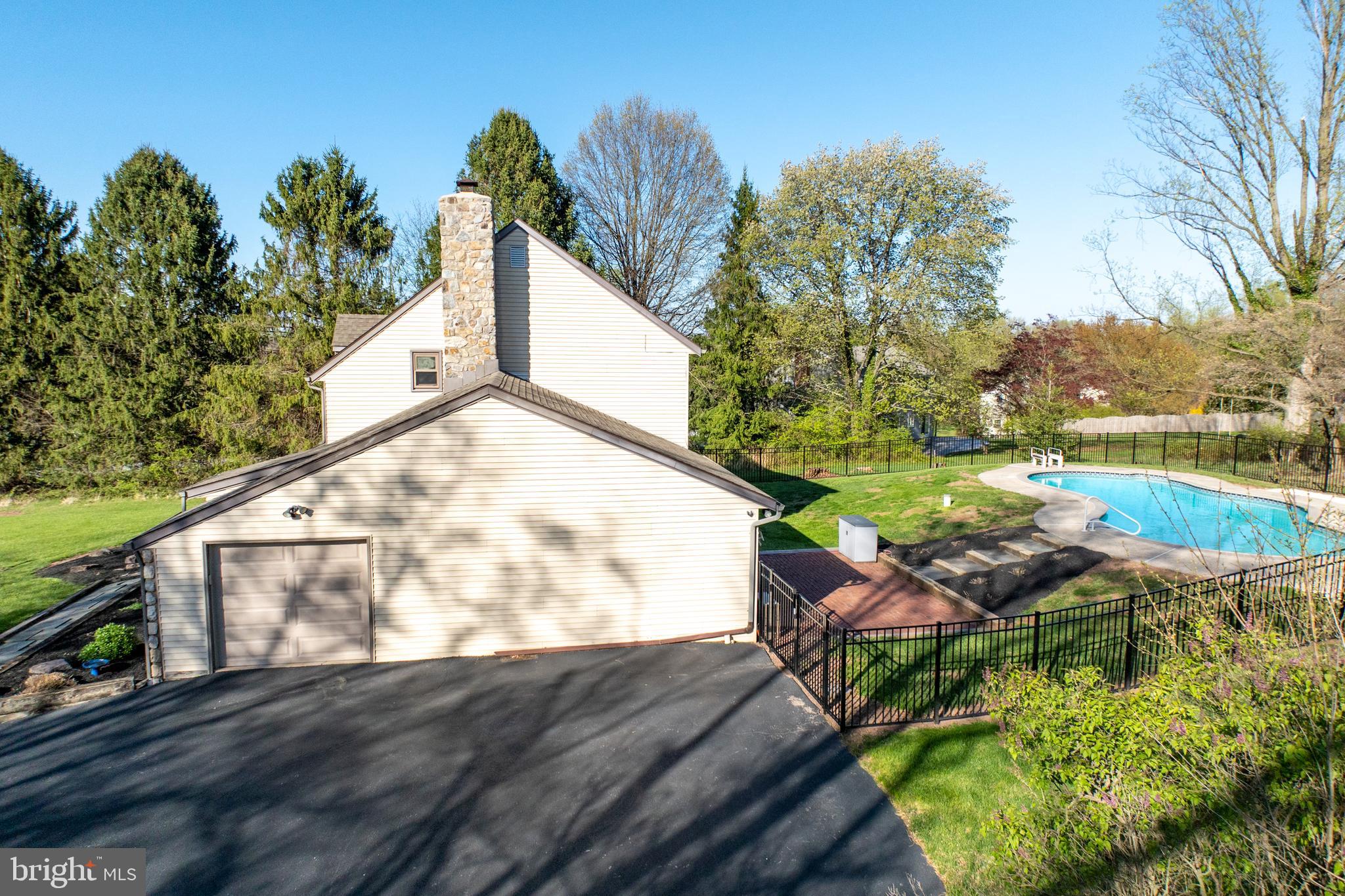 800 Scholl Road Pottstown, PA 19465 - Photo 5 of 49 a view of a backyard with sitting area