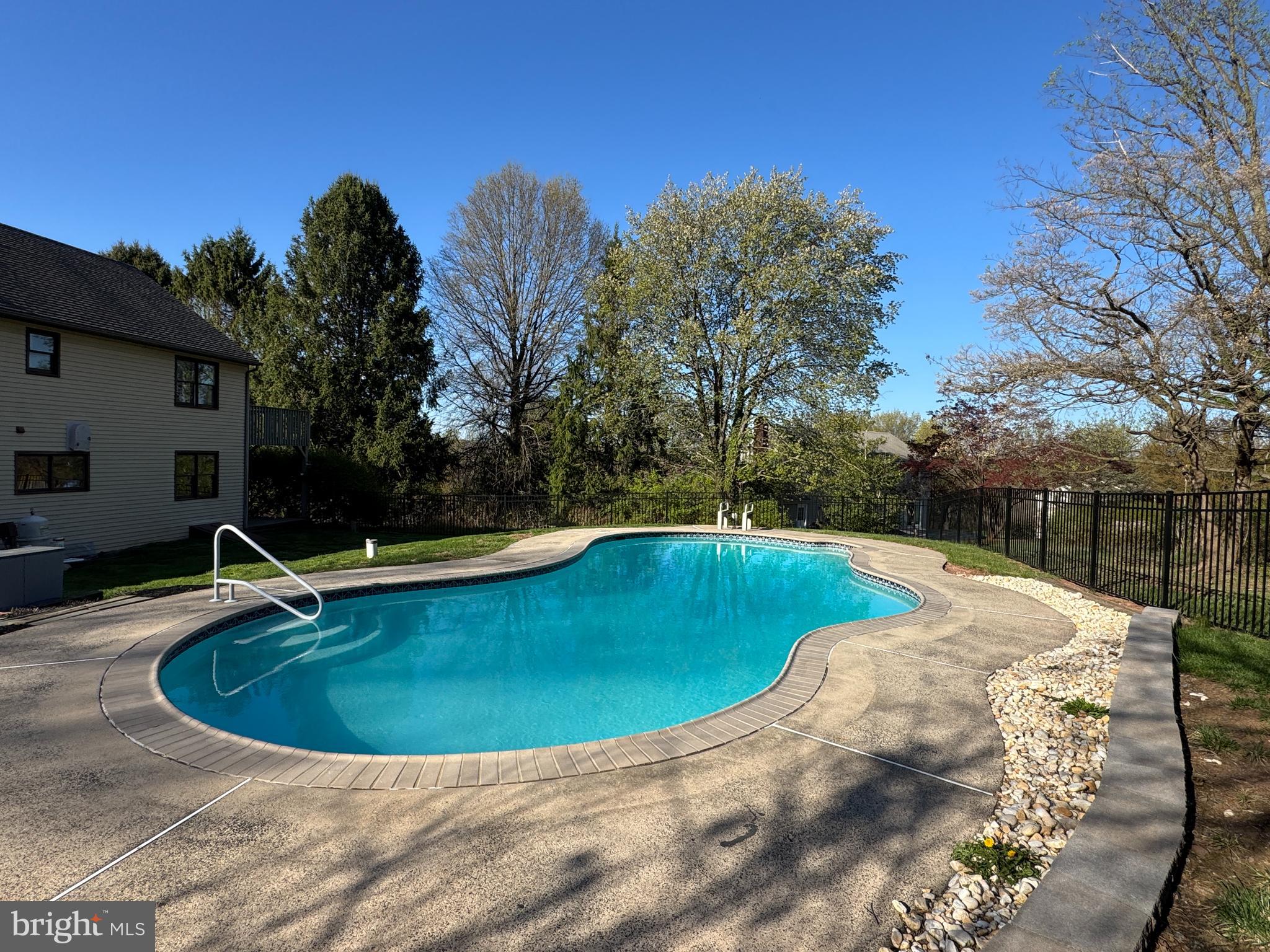 800 Scholl Road Pottstown, PA 19465 - Photo 10 of 49 a view of a swimming pool with a yard