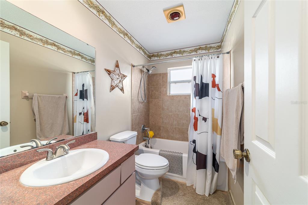 4350 Southwest 89th Avenue Ocala, FL 34481 - Photo 50 of 90 a bathroom with a sink toilet and shower