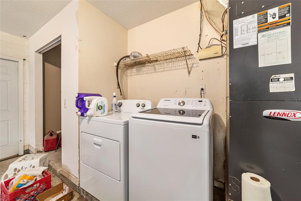 4350 Southwest 89th Avenue Ocala, FL 34481 - Photo 67 of 90 a utility room with dryer and washer