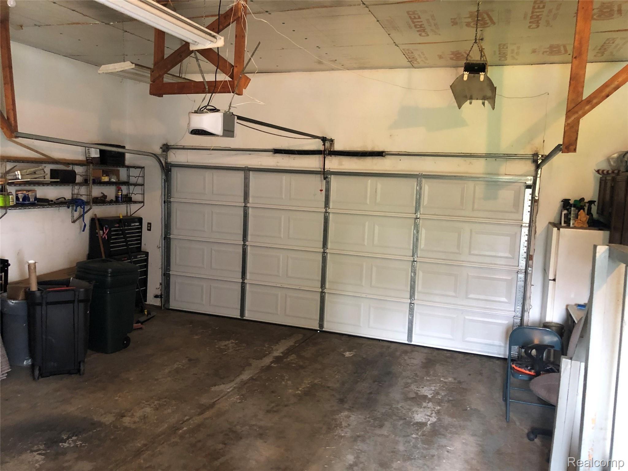 520 North Tipsico Lake Road Highland, MI 48357 - Photo 26 of 34 garage 1.jpg