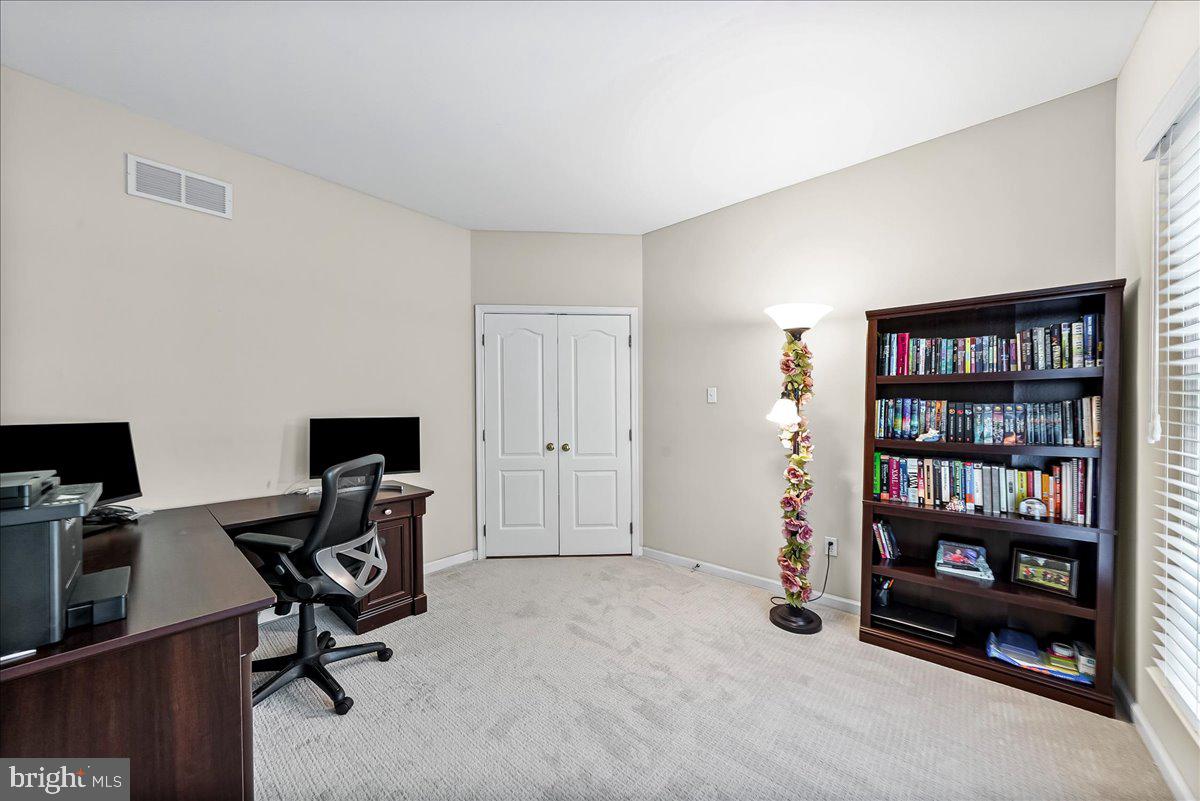 408 Brentford Road Kennett Square, PA 19348 - Photo 17 of 41 a view of a workspace with furniture and closet