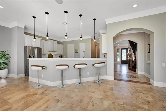 a view of a kitchen with furniture and a kitchen