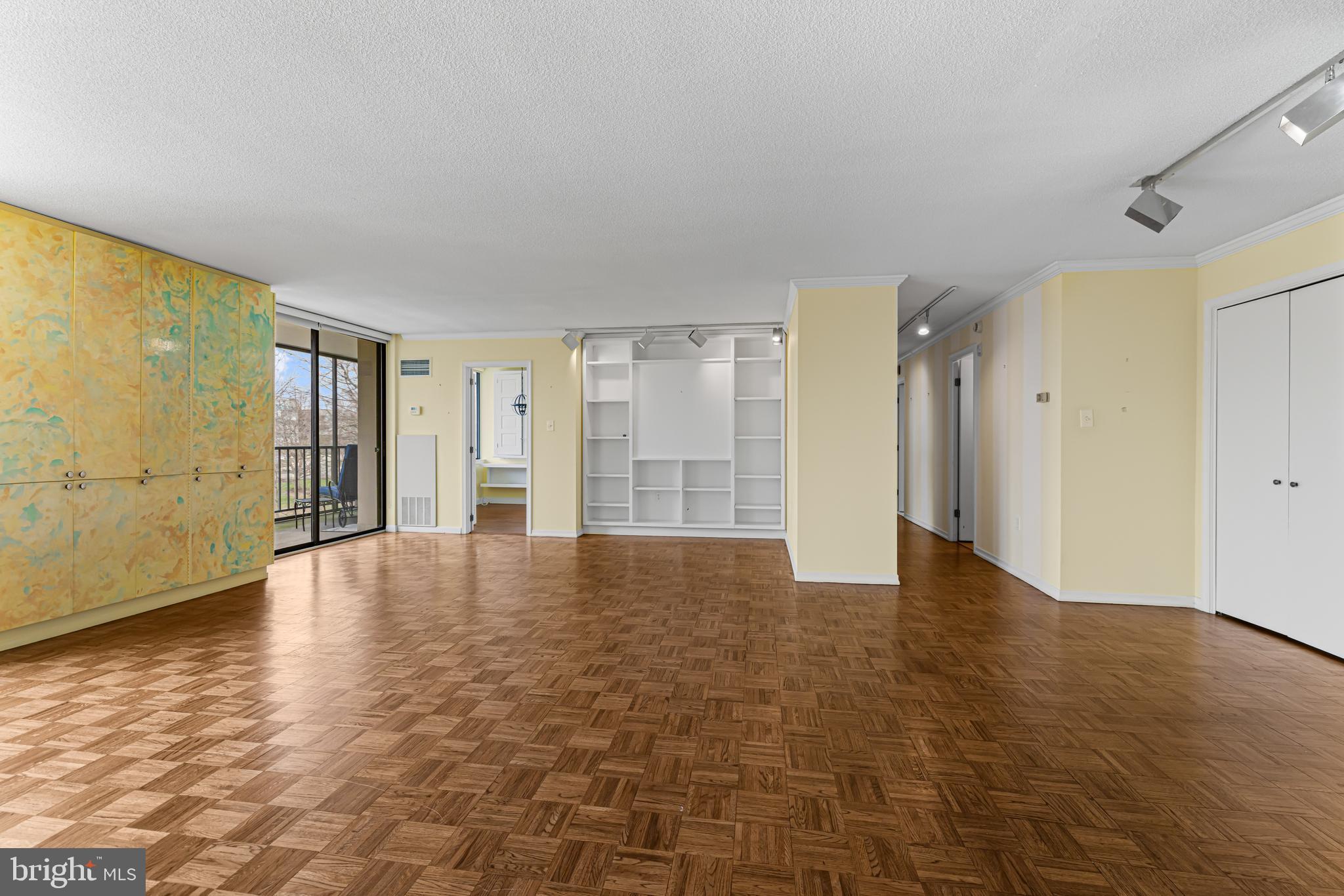 8302 Old York Road, Unit B42 Elkins Park, PA 19027 - Photo 11 of 42 a view of an empty room with wooden floor and a window
