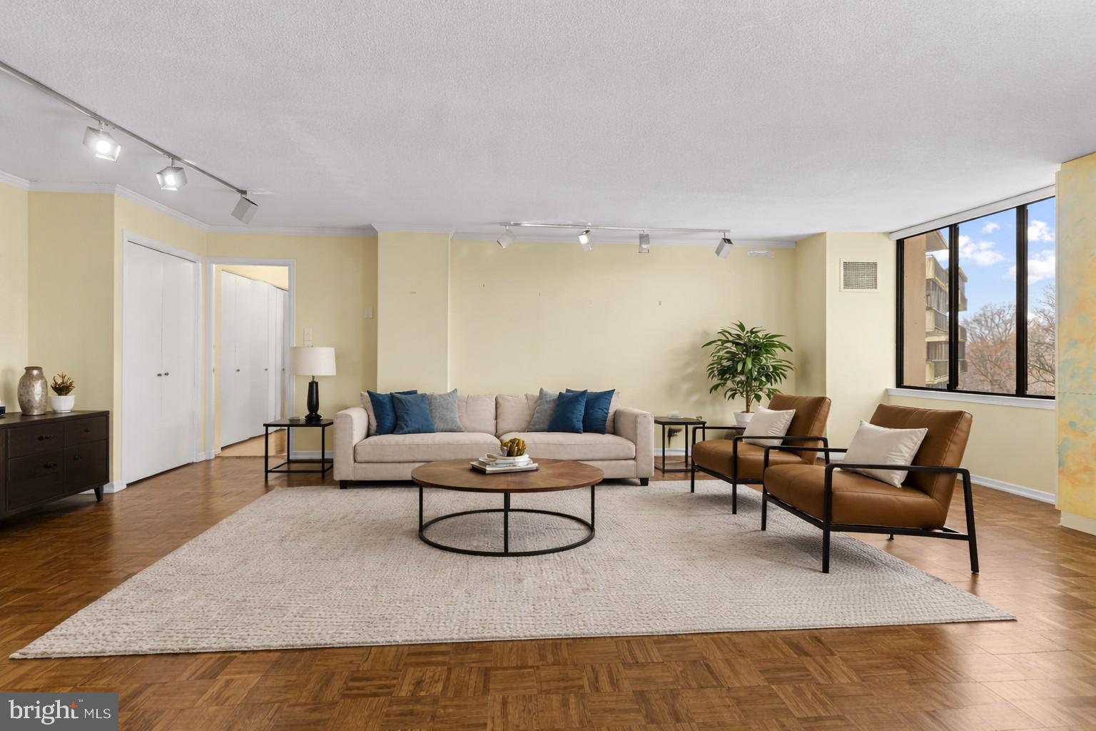 8302 Old York Road, Unit B42 Elkins Park, PA 19027 - Photo 15 of 42 a living room with furniture and wooden floor