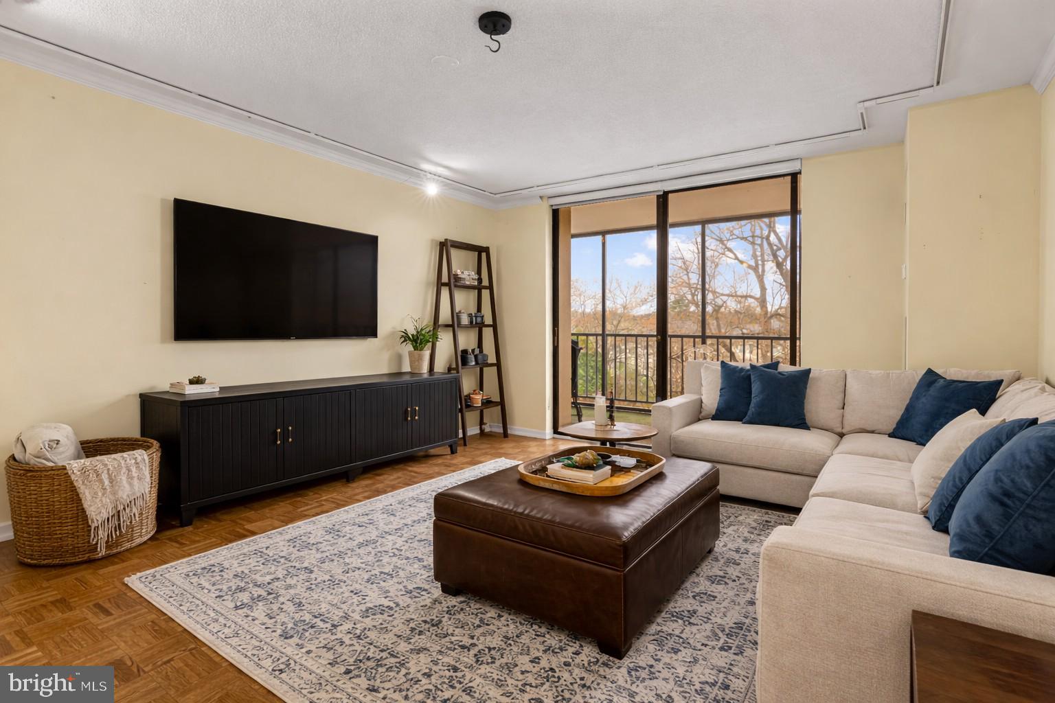 8302 Old York Road, Unit B42 Elkins Park, PA 19027 - Photo 22 of 42 a living room with furniture and a flat screen tv
