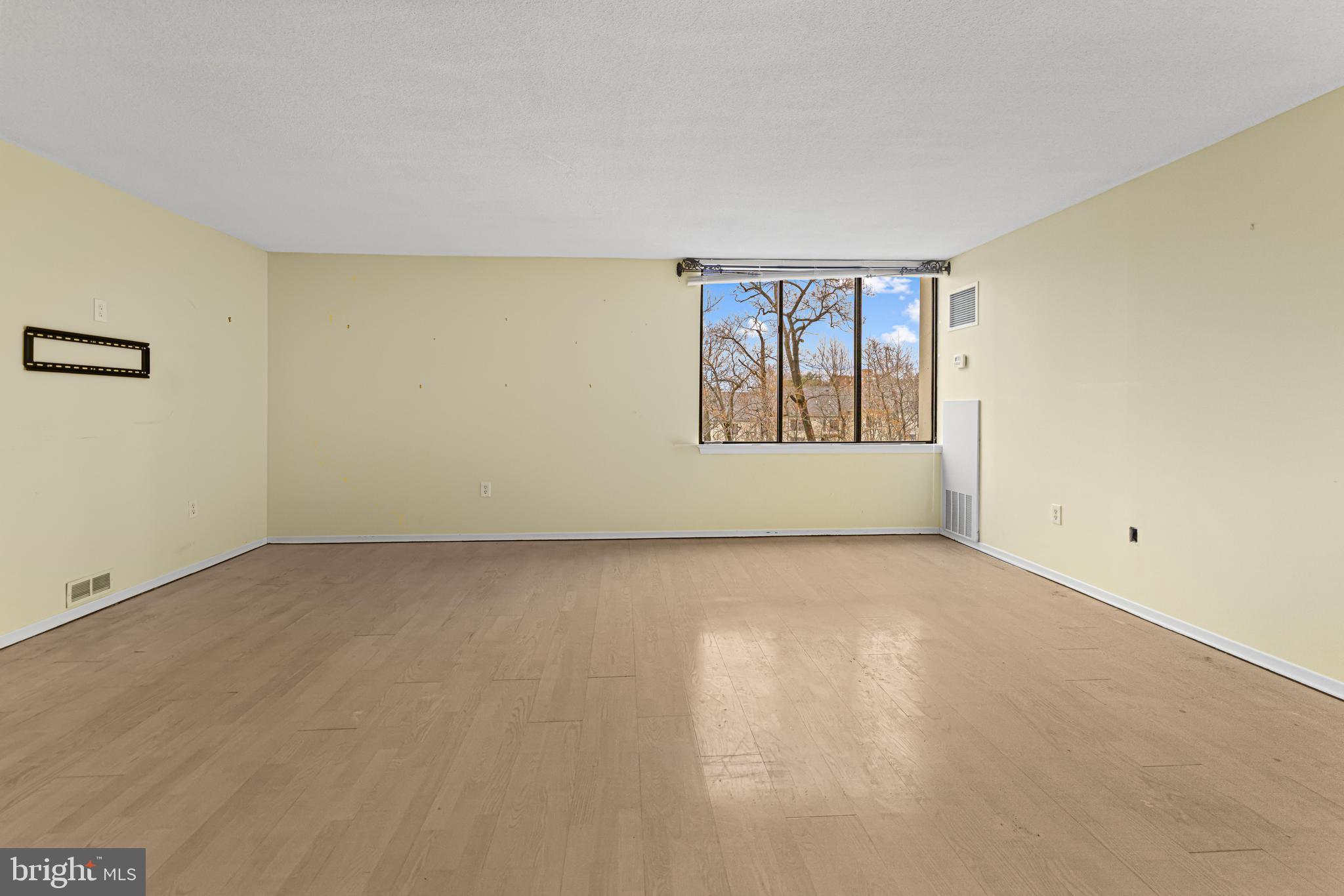 8302 Old York Road, Unit B42 Elkins Park, PA 19027 - Photo 26 of 42 an empty room with windows