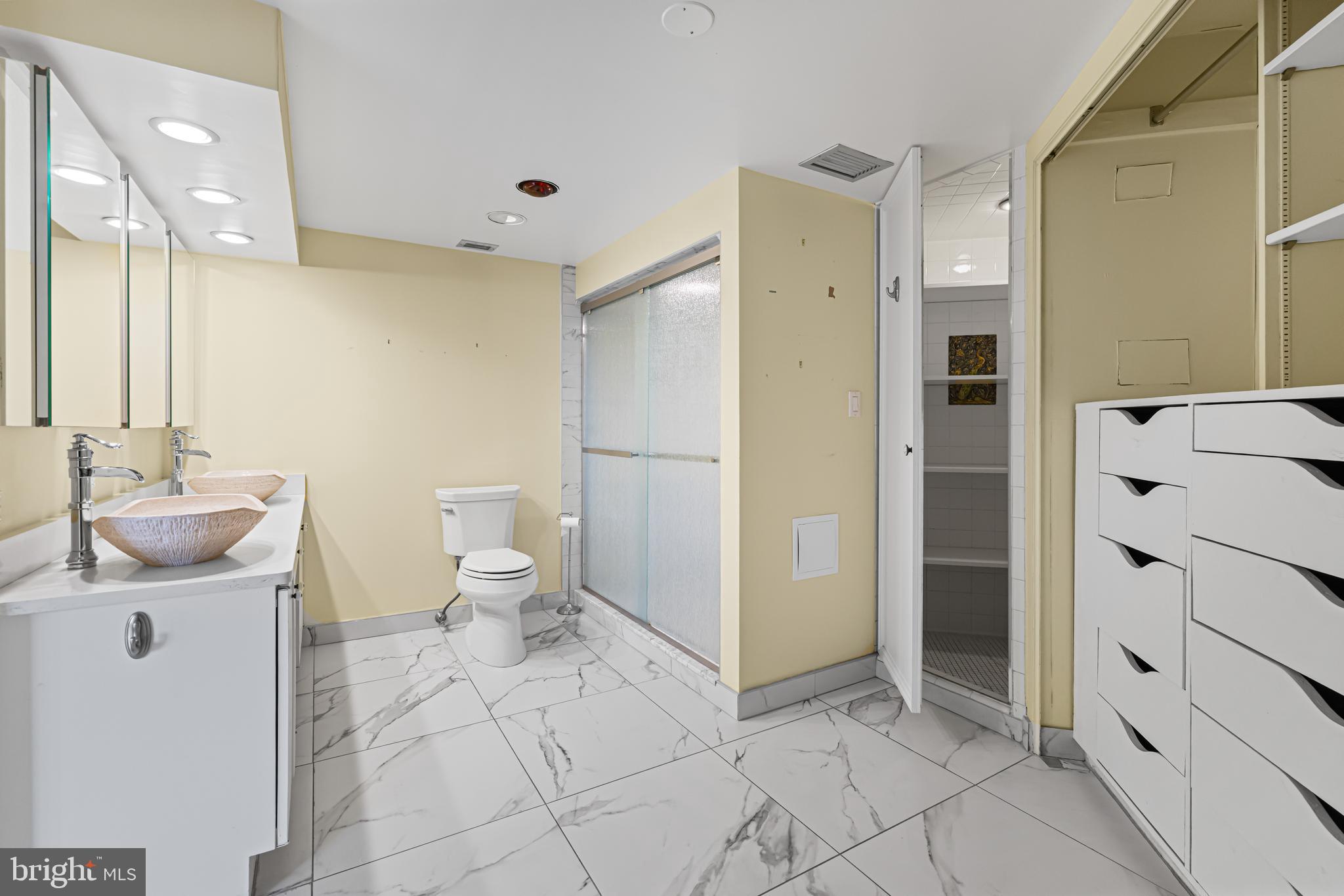 8302 Old York Road, Unit B42 Elkins Park, PA 19027 - Photo 29 of 42 a bathroom with a sink toilet and shower