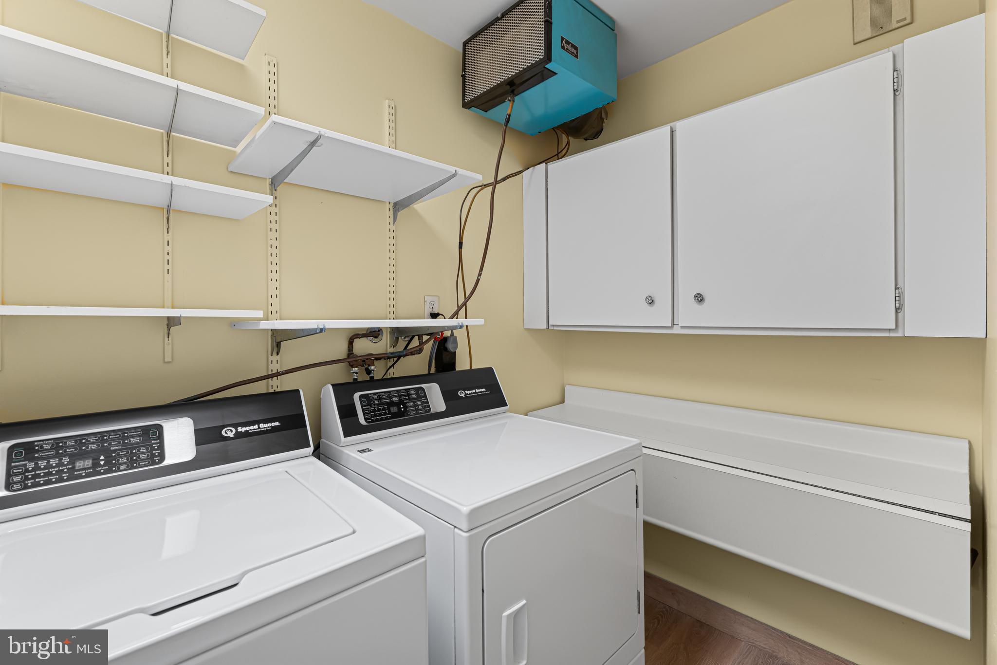 8302 Old York Road, Unit B42 Elkins Park, PA 19027 - Photo 36 of 42 a utility room with dryer and washer