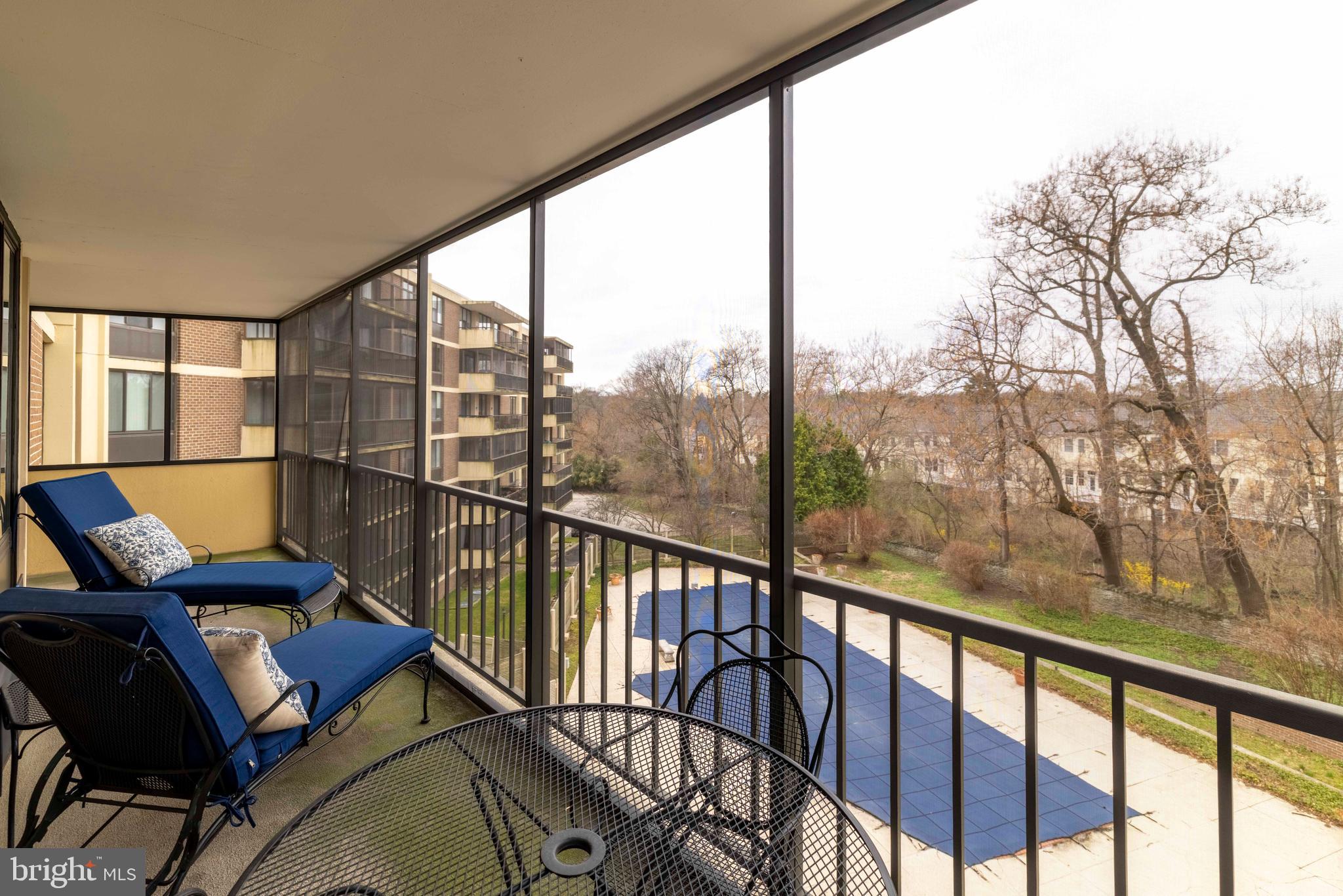 8302 Old York Road, Unit B42 Elkins Park, PA 19027 - Photo 37 of 42 a view of a city from a balcony with furniture
