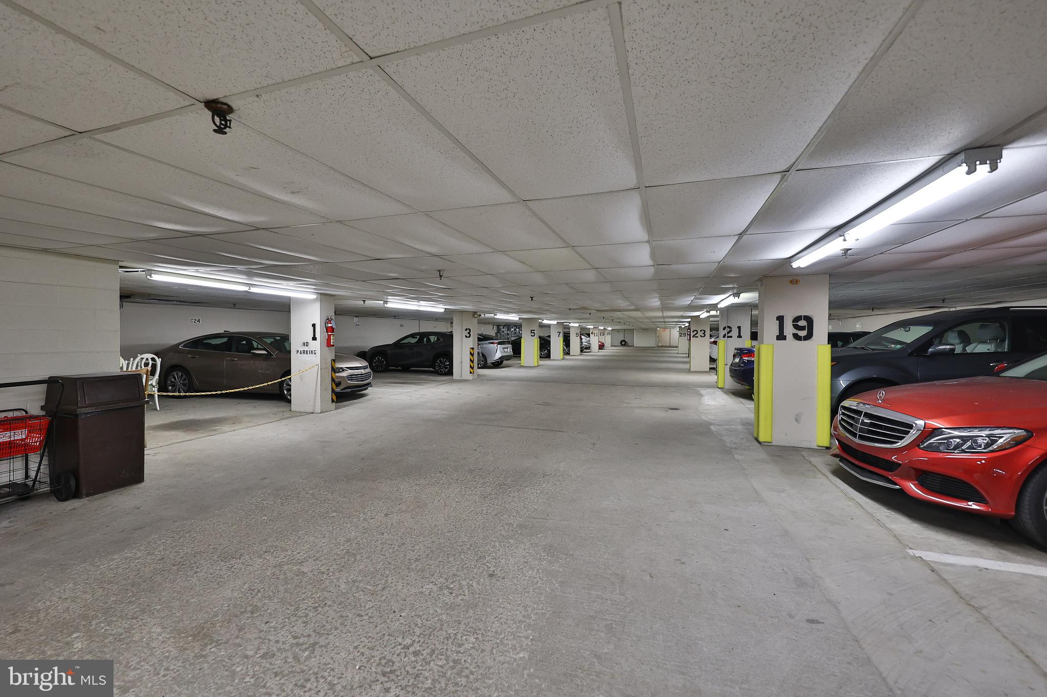 8302 Old York Road, Unit B42 Elkins Park, PA 19027 - Photo 39 of 42 a view of parking garage with cars