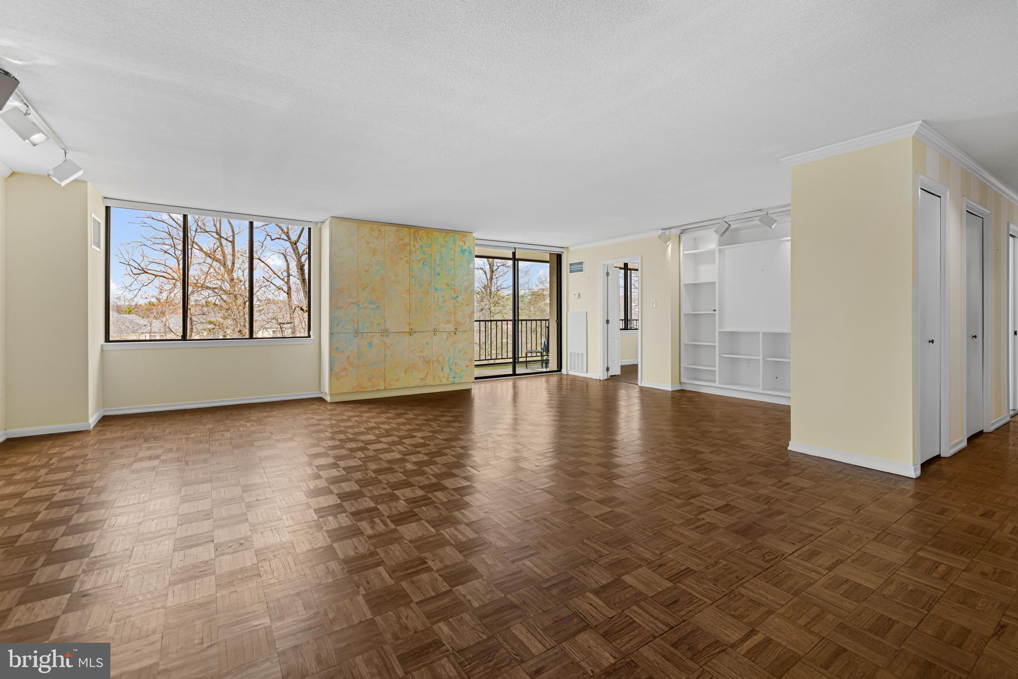 8302 Old York Road, Unit B42 Elkins Park, PA 19027 - Photo 9 of 42 wooden floor in an empty room with a window
