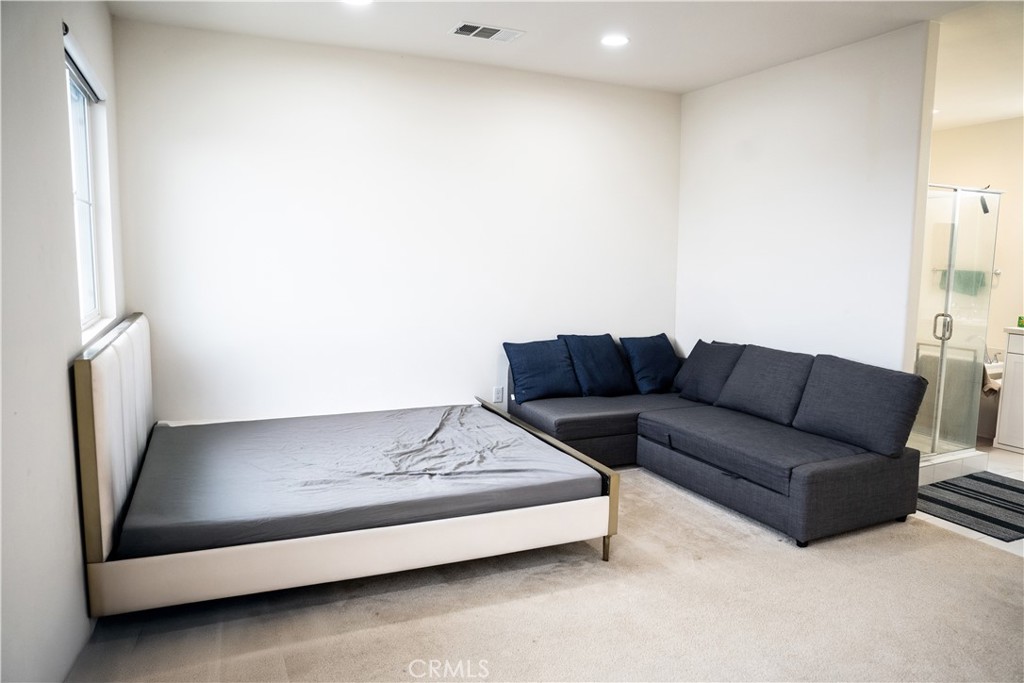 21125 Normandie Avenue Torrance, CA 90501 - Photo 16 of 20 a living room with furniture and a window