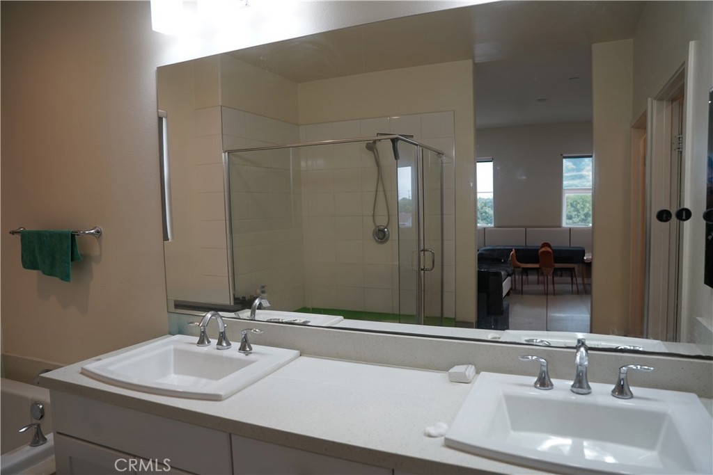 21125 Normandie Avenue Torrance, CA 90501 - Photo 18 of 20 a bathroom with a sink and a mirror