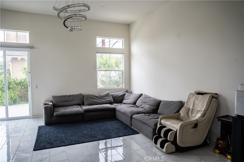 21125 Normandie Avenue Torrance, CA 90501 - Photo 6 of 20 a living room with furniture and a window