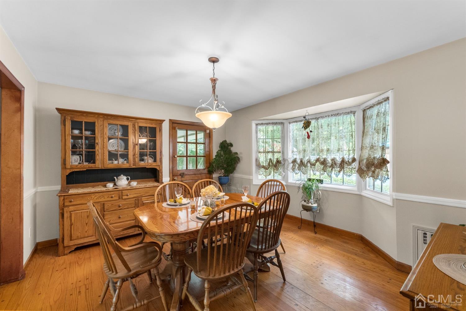 417 Ridge Road Dayton, NJ 08810 - Photo 12 of 37 a view of a dining room with furniture window and outside view