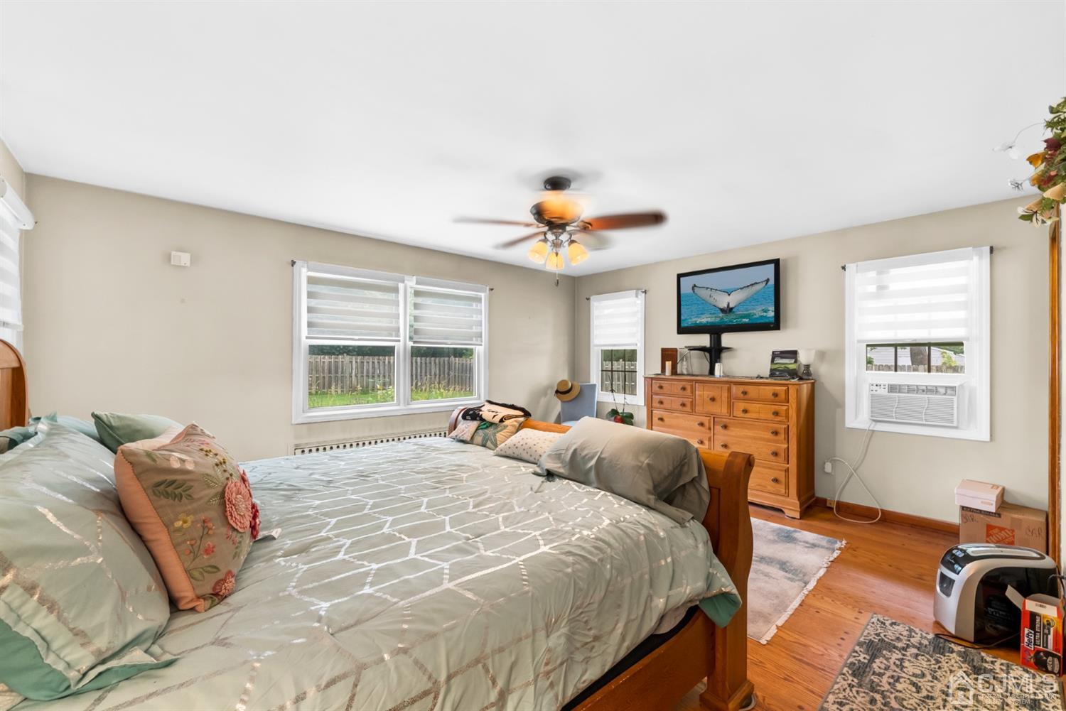 417 Ridge Road Dayton, NJ 08810 - Photo 17 of 37 a bedroom with a bed and a couch
