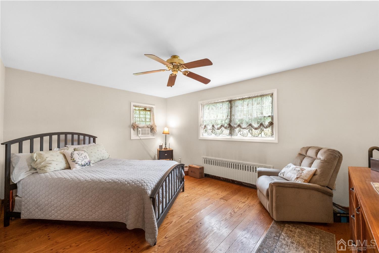 417 Ridge Road Dayton, NJ 08810 - Photo 20 of 37 a bedroom with a bed couch and window