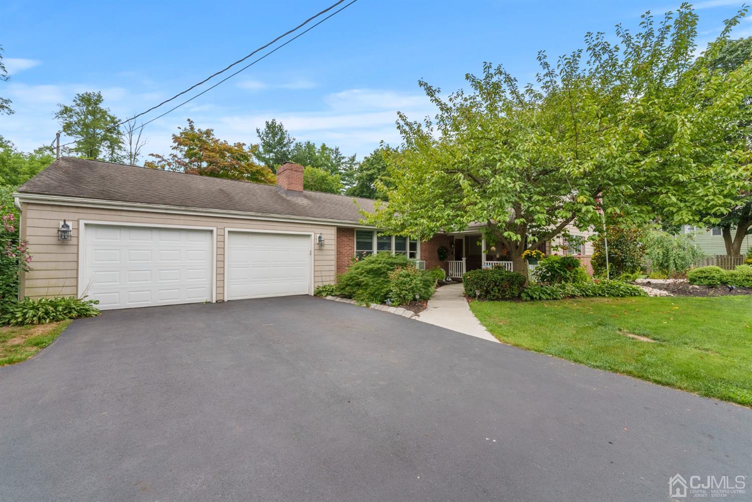 417 Ridge Road Dayton, NJ 08810 - Photo 2 of 37 front view of a house with a yard
