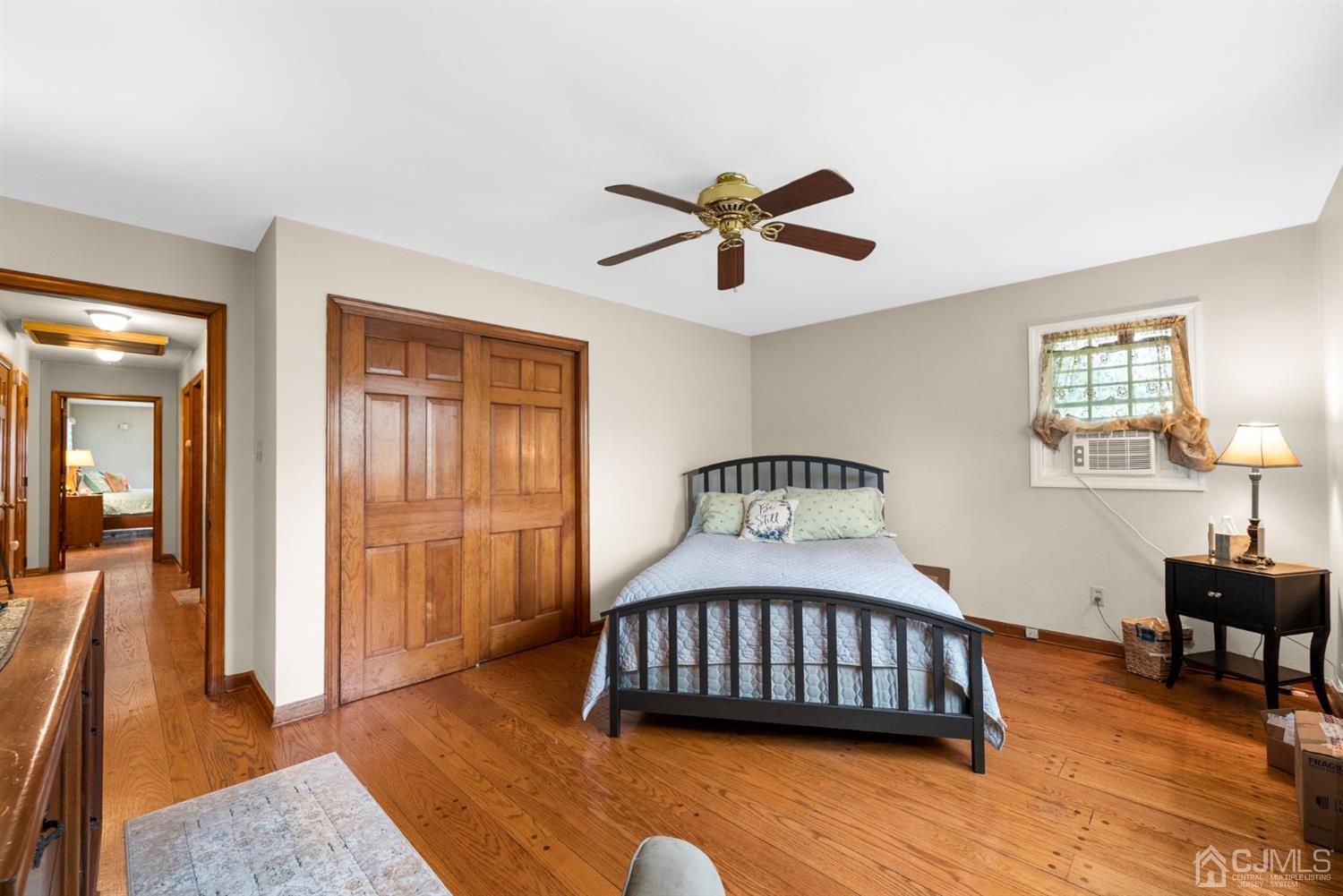 417 Ridge Road Dayton, NJ 08810 - Photo 21 of 37 a bedroom with a bed window and a table