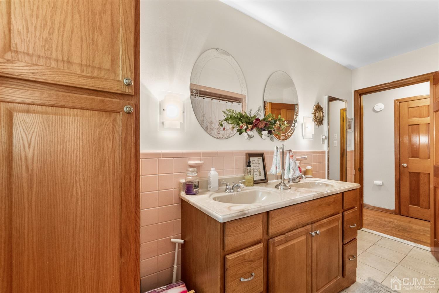 417 Ridge Road Dayton, NJ 08810 - Photo 24 of 37 a bathroom with a sink and a mirror