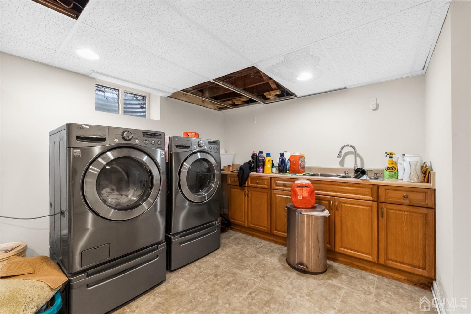 417 Ridge Road Dayton, NJ 08810 - Photo 25 of 37 a utility room with sink dryer and washer