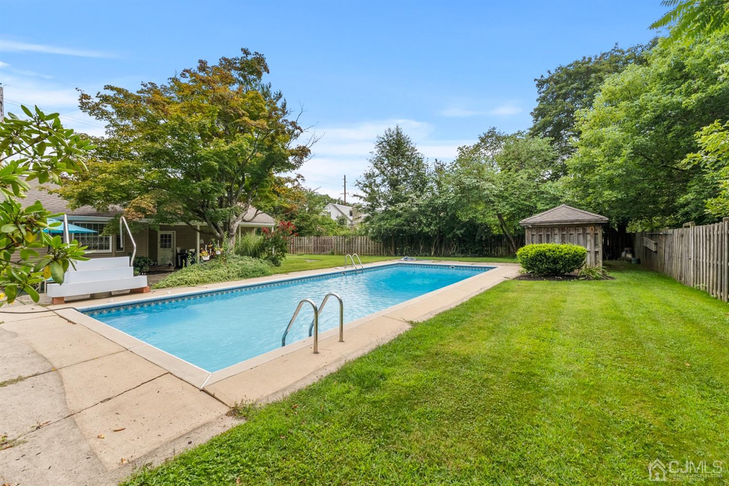 417 Ridge Road Dayton, NJ 08810 - Photo 30 of 37 a view of a mini pool with a yard