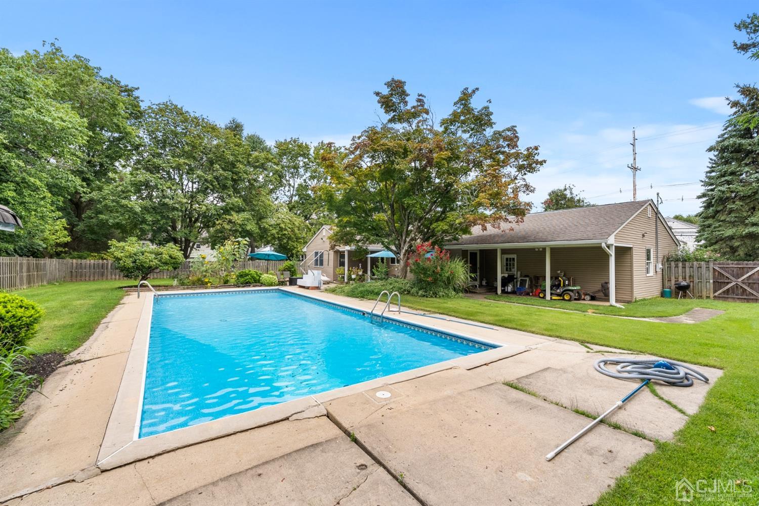 417 Ridge Road Dayton, NJ 08810 - Photo 32 of 37 a view of a house with a swimming pool