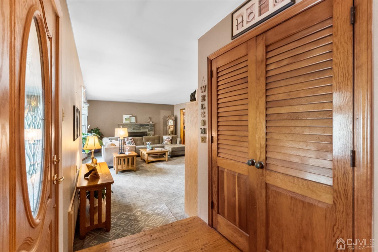 417 Ridge Road Dayton, NJ 08810 - Photo 5 of 37 a view of a livingroom with furniture and a gate