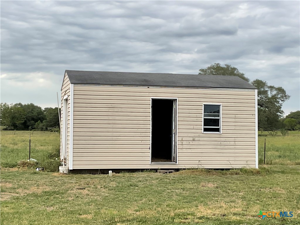 383 County Road 233 Hallettsville, TX 77964 - Photo 45 of 48 a view of a white house with a yard