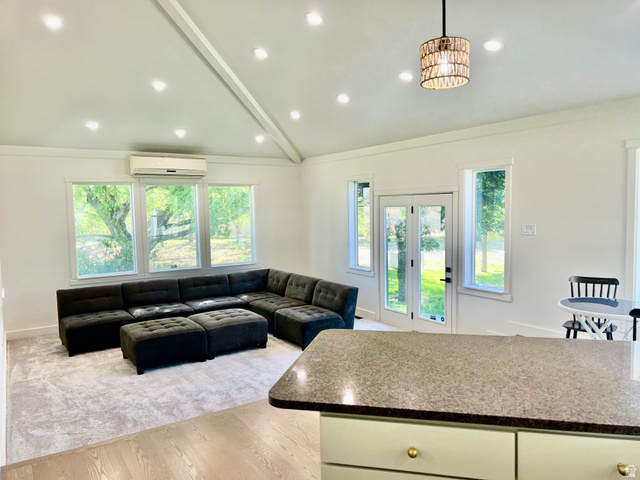 812 East Bates Cyn Road Tooele, UT 84074 - Photo 32 of 144 Vaulted ceiling with recessed lighting and a decorative pendant fixture