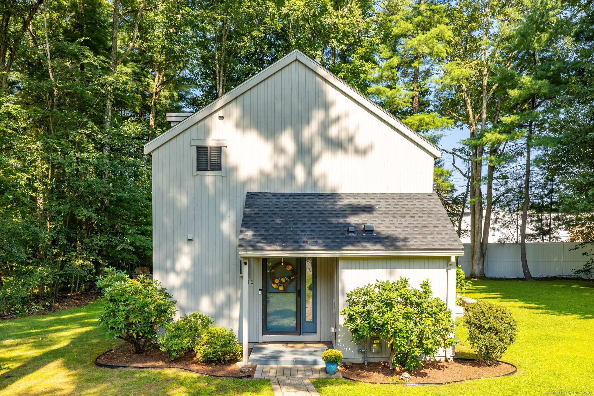 a house view with a garden space