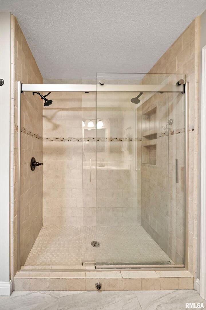 300 2nd Avenue Hampton, IL 61256 - Photo 13 of 32 a bathroom with a shower