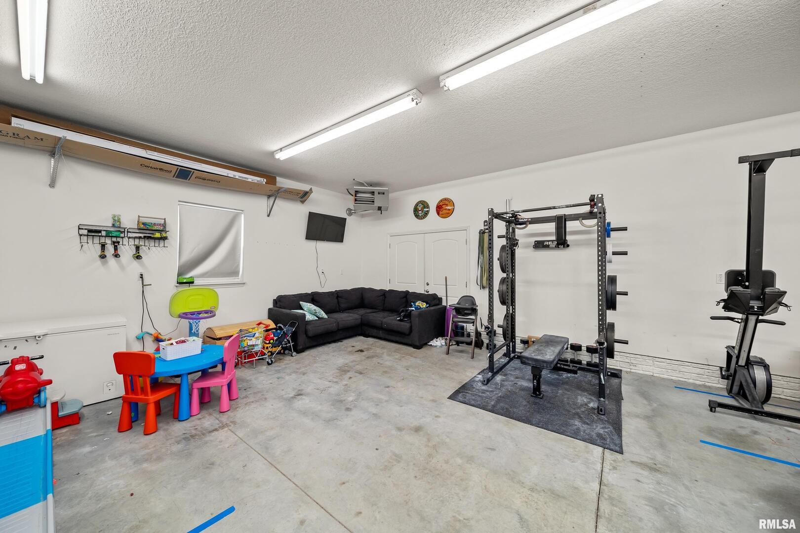 300 2nd Avenue Hampton, IL 61256 - Photo 28 of 32 a living room with furniture and a table
