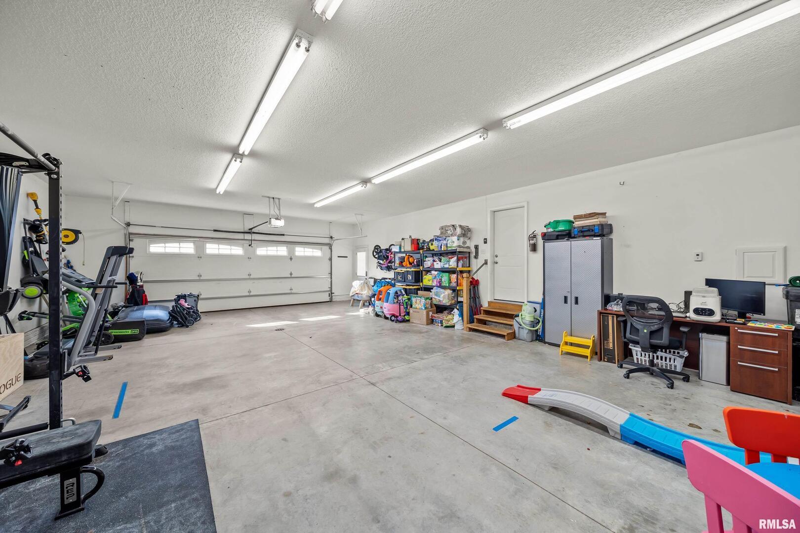 300 2nd Avenue Hampton, IL 61256 - Photo 29 of 32 a view of a room with gym equipment