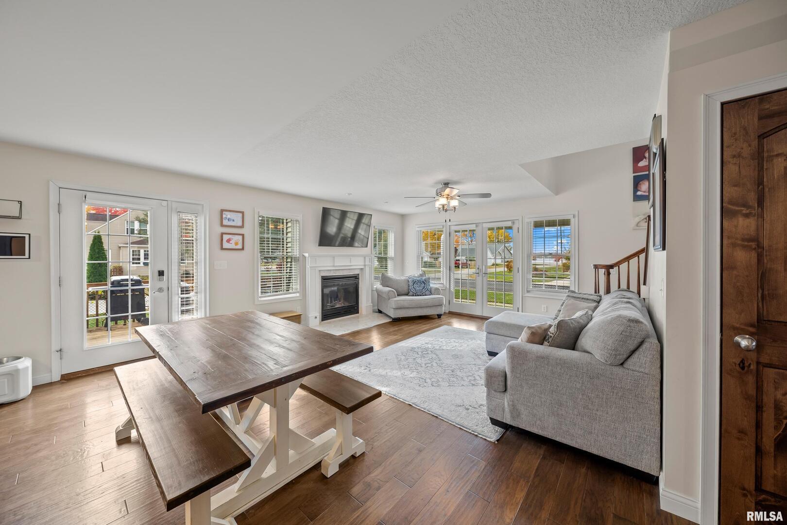 300 2nd Avenue Hampton, IL 61256 - Photo 5 of 32 a living room with furniture and wooden floor