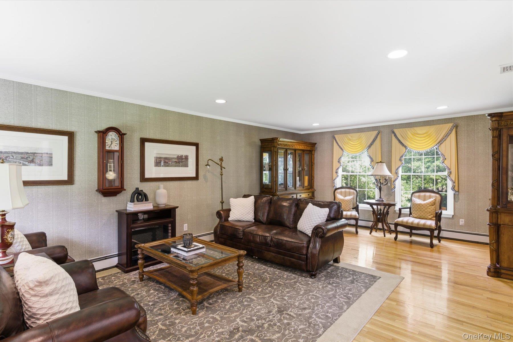 6 Brandy Road Cold Spring Harbor, NY 11724 - Photo 12 of 25 a living room with furniture and a large window