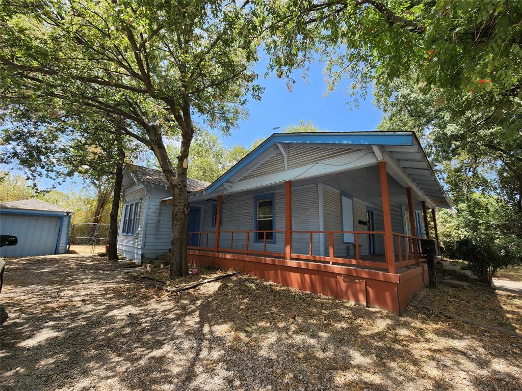 511 West Sycamore Street, Unit A Denton, TX 76201 - Photo 10 of 10 Rear view of house with covered porch