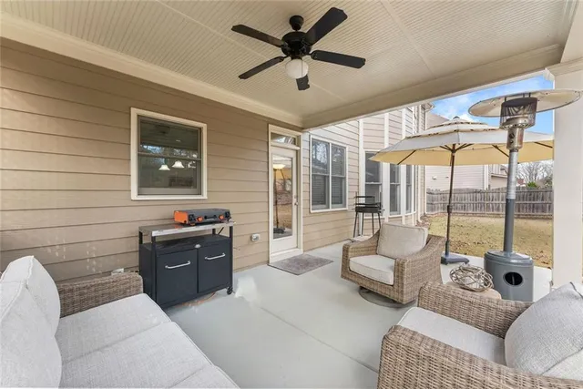 a view of a yard with snow on the road