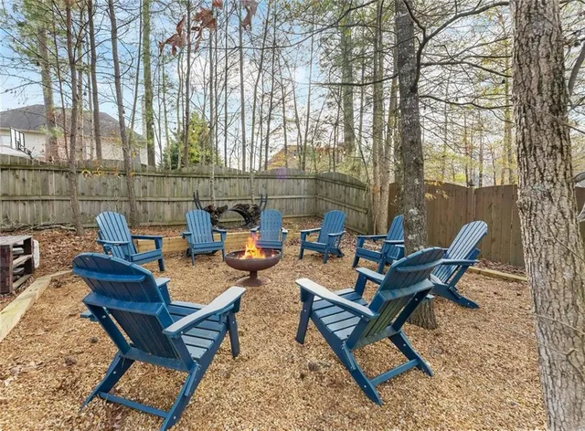 a building outdoor space with patio furniture and a patio